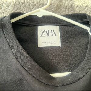 Large black prince sweater